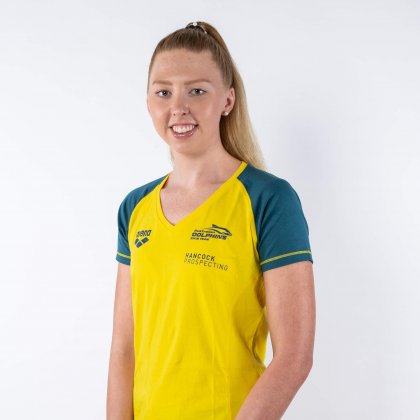 Lakeisha Patterson standing in front of a white backdrop, wearing an Australian uniform